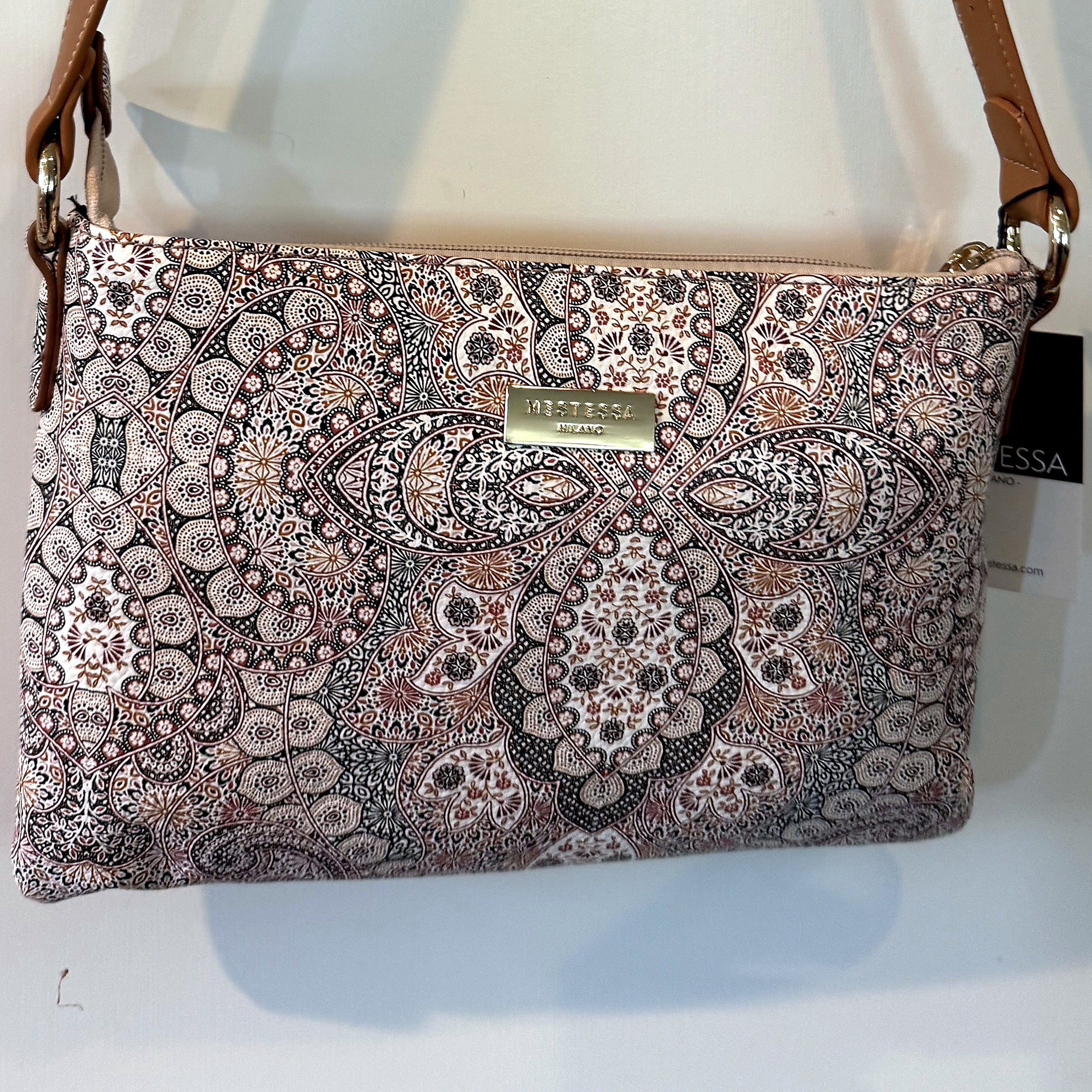 Mestessa Milano Sofia crossbody pochette in paisley print with tan strap and gold hardware